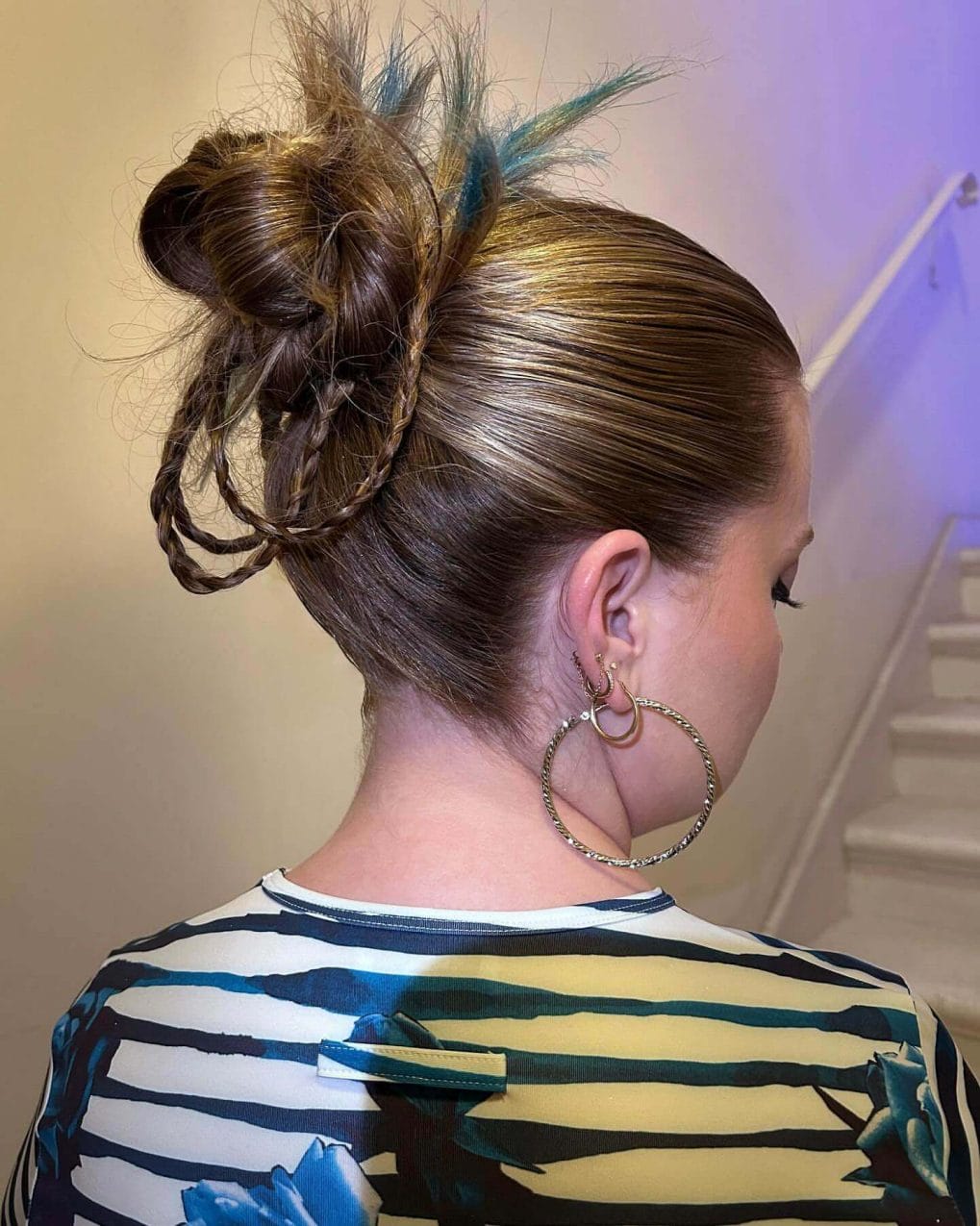 High bun with braids and blue highlights