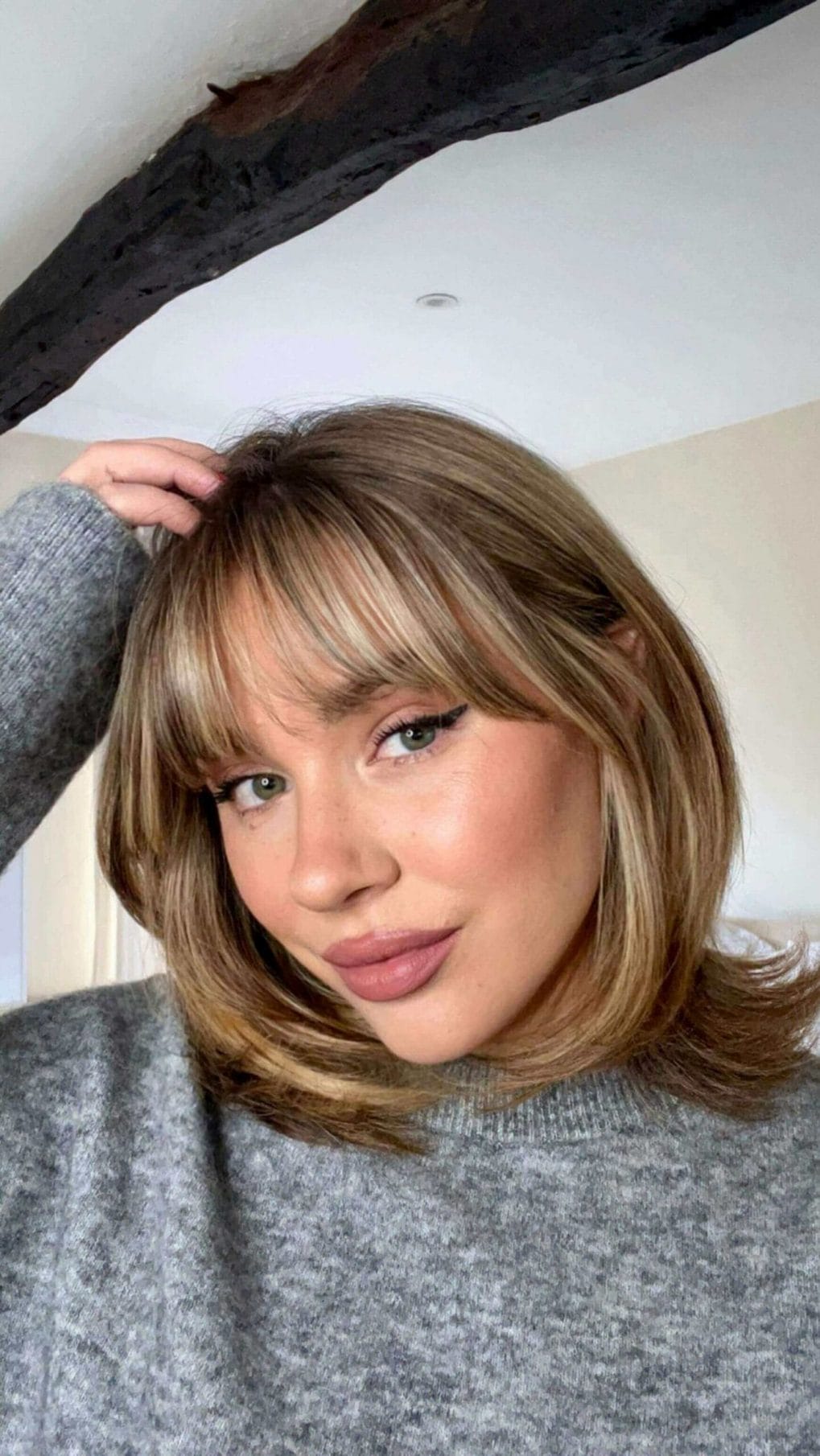 Honey-blonde bob with see-through bangs