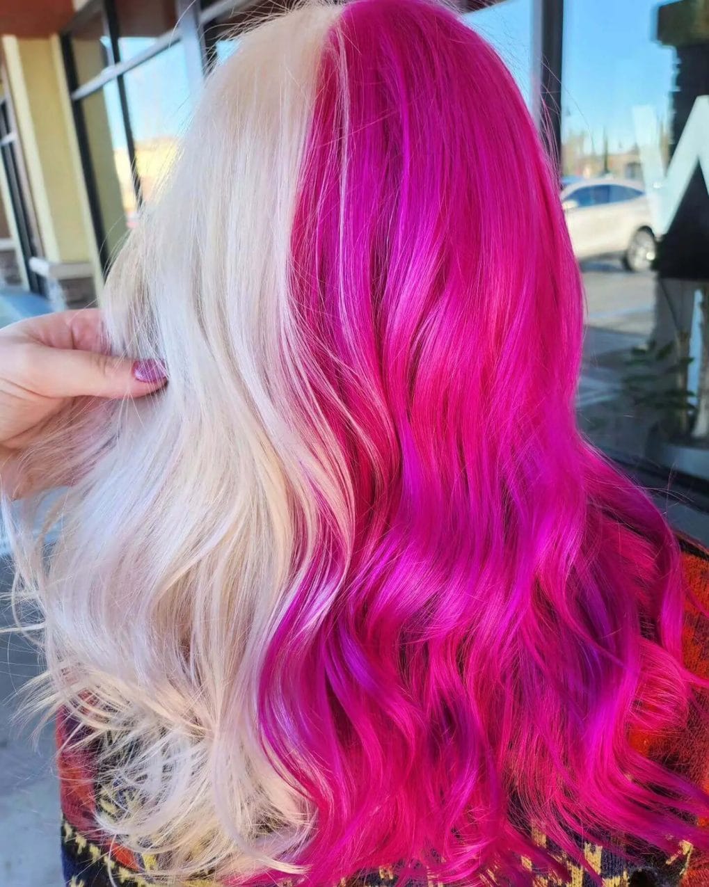 Hot pink and platinum sides split down the middle in a bold look