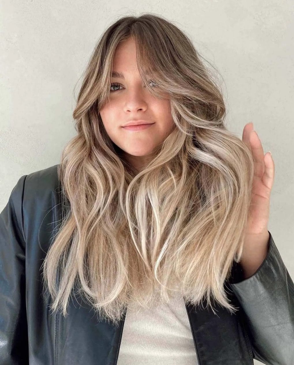Ethereal iridescent blonde with voluminous layers