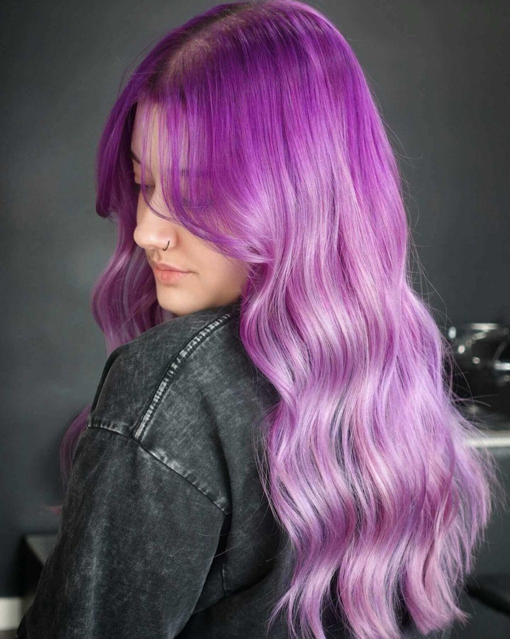 Cool jewel-toned purple long waves with elegant side sweep
