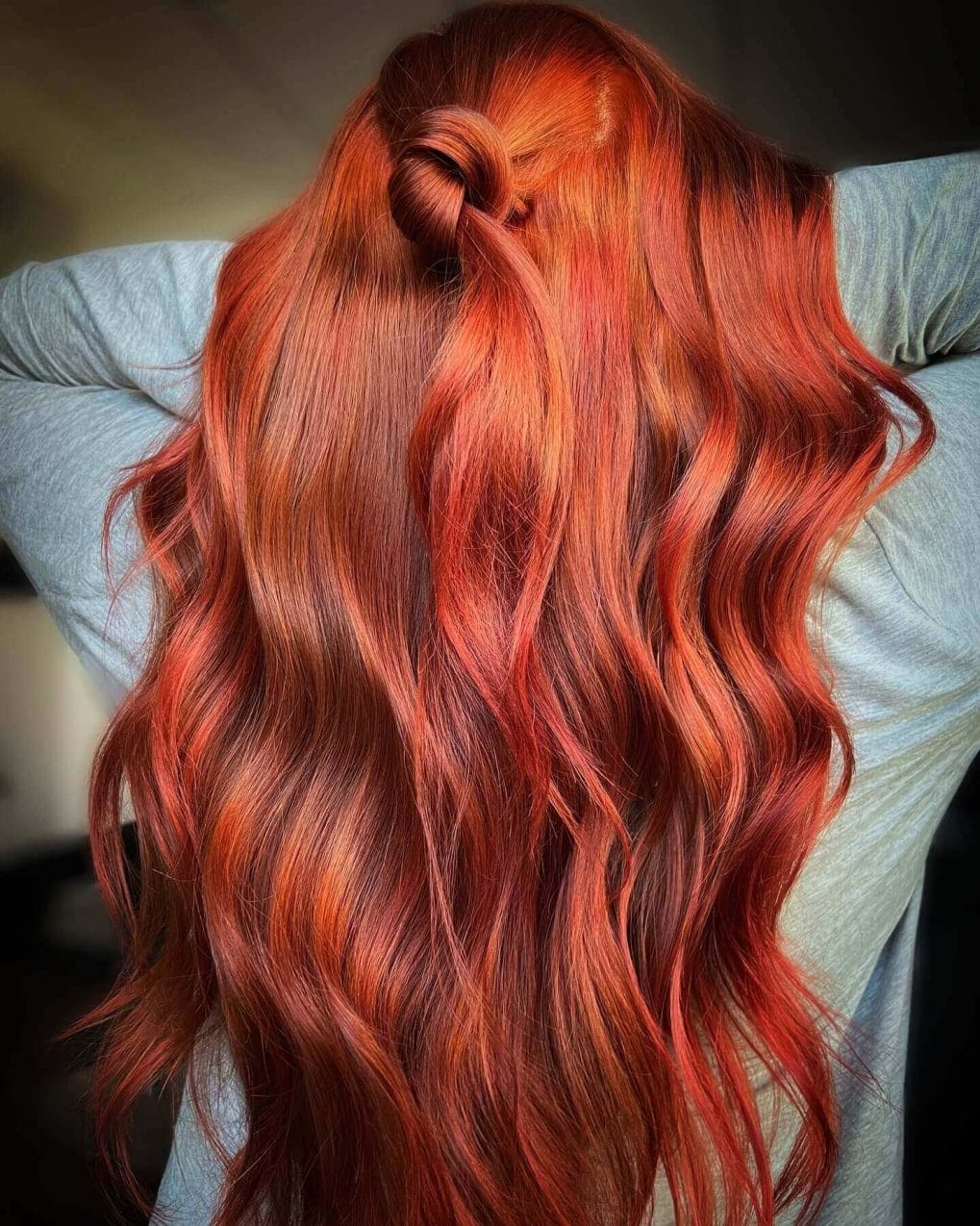 Lava flow waves in fiery red shades from orange to burgundy