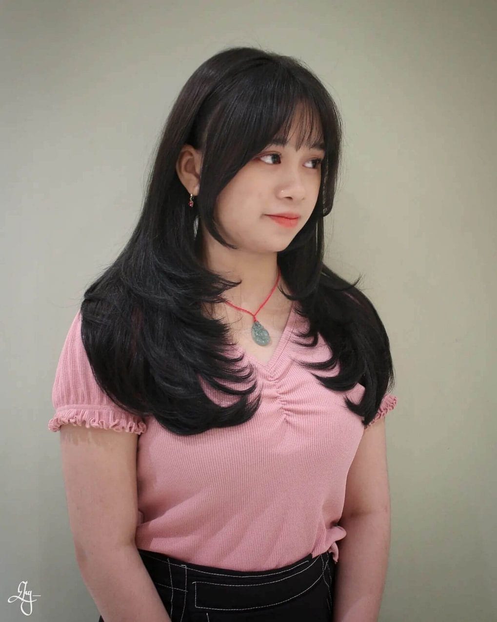 Long dark layers with see-through bangs