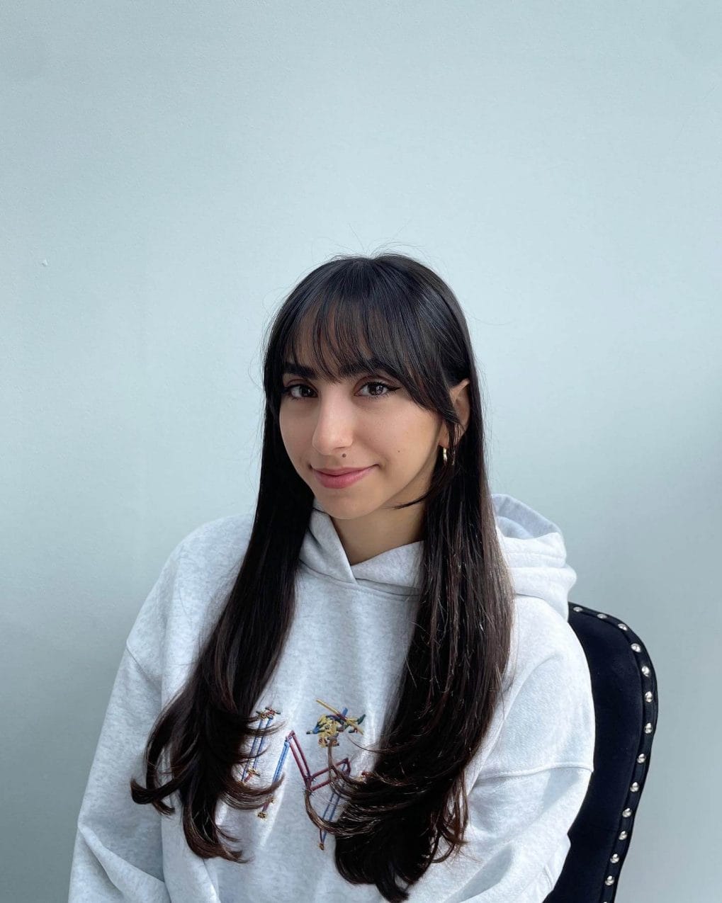 Long flowing layers with see-through bangs