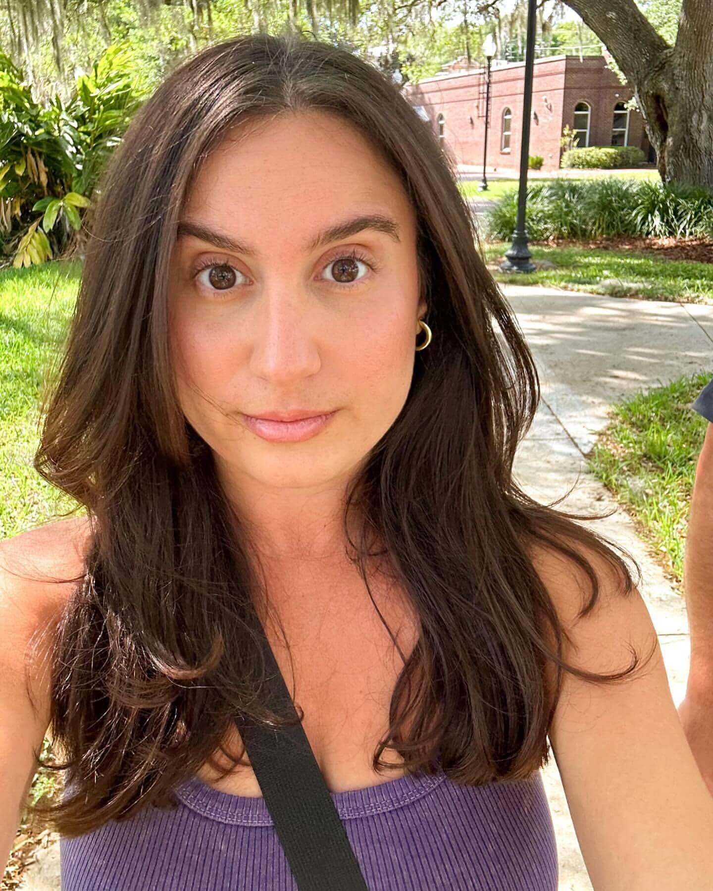 Long natural layered hair with relaxed 90s vibe