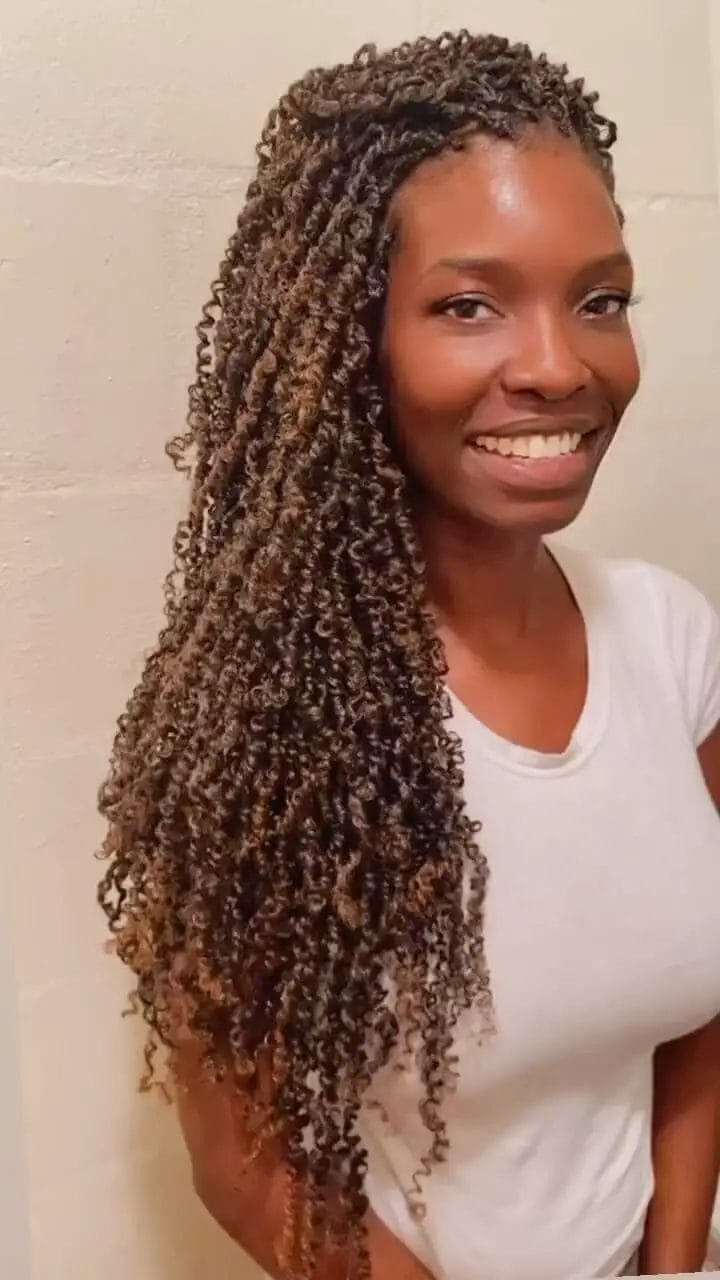 Long twists blending from black to brown and blonde ends