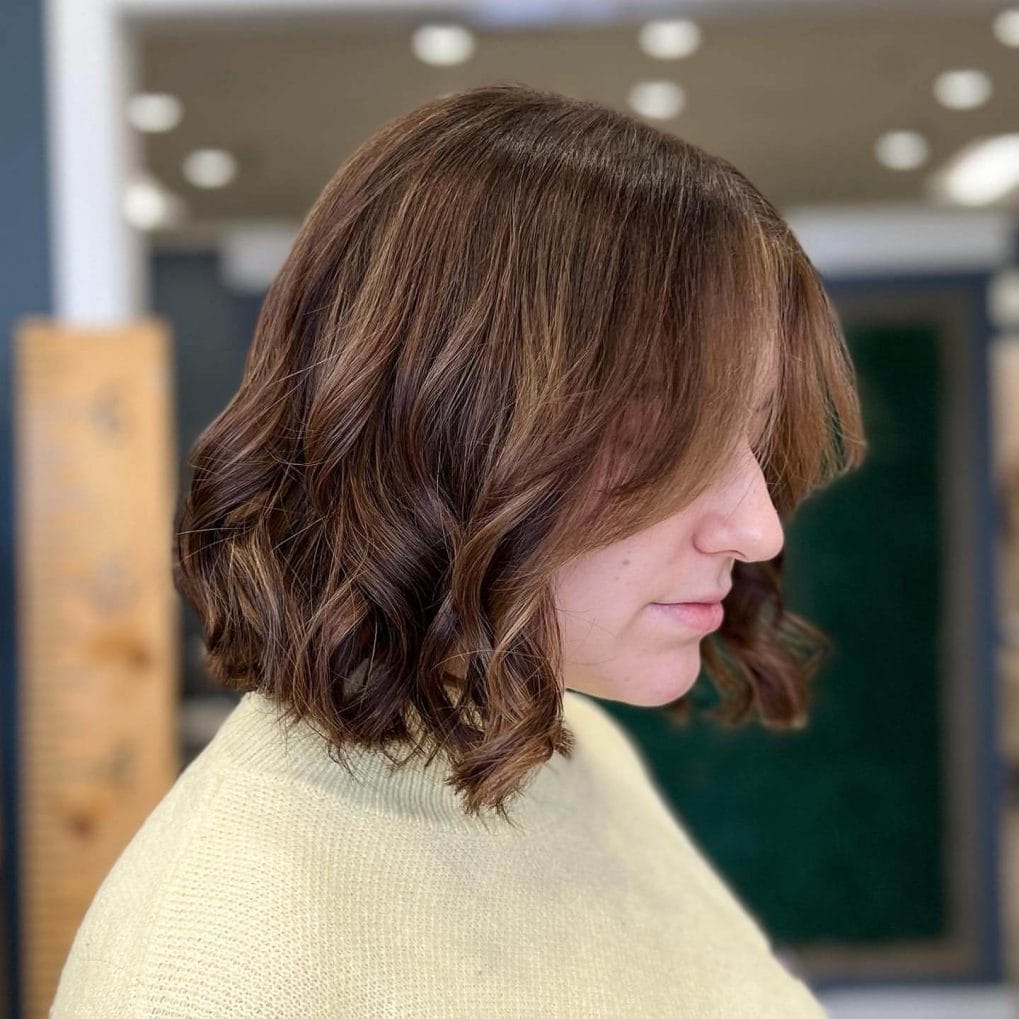 Loose wavy bob with gentle curtain bangs