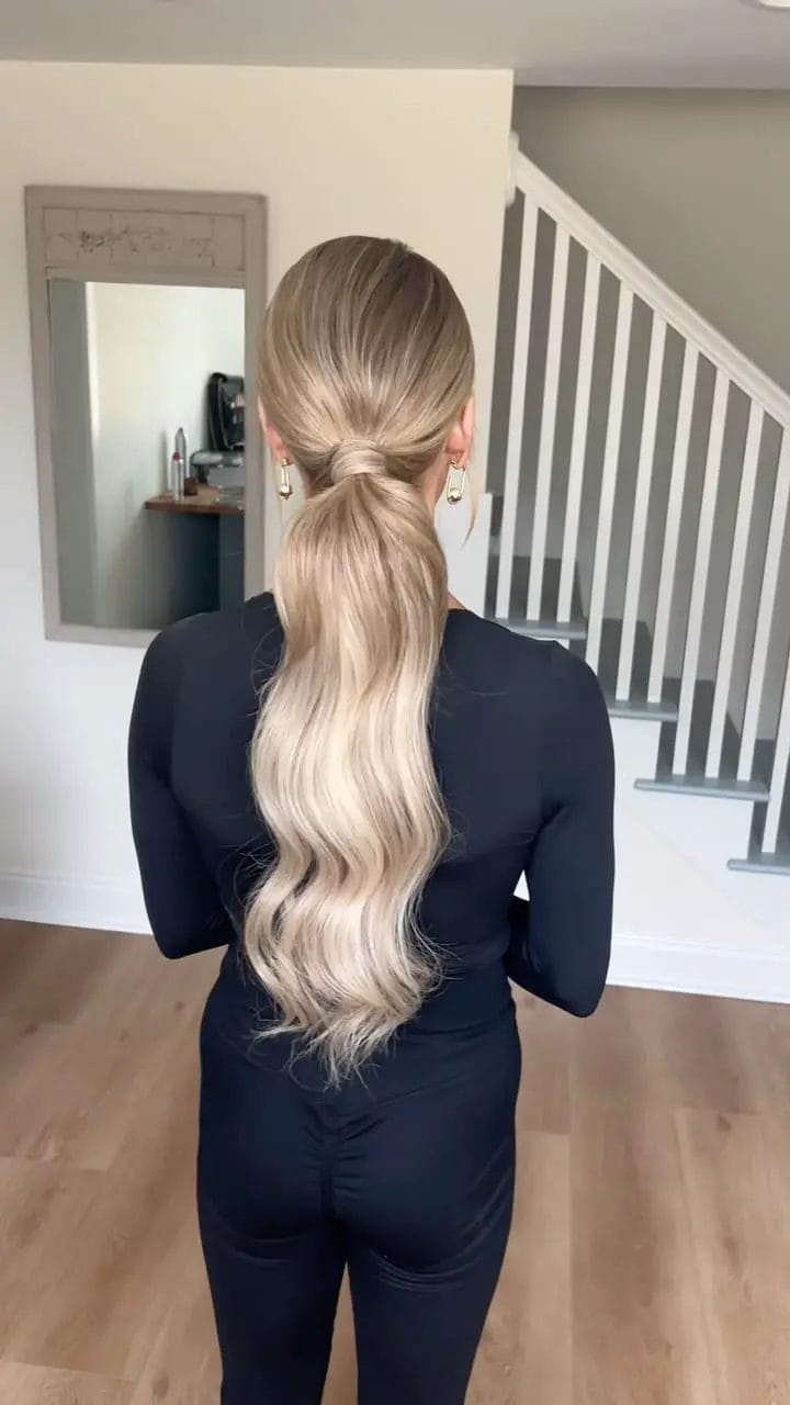 Ash blonde and brown low ponytail with a gentle wave for classy volleyball players