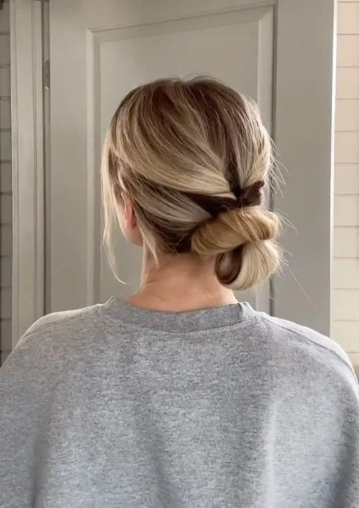 Relaxed low twisted bun for beating the summer heat