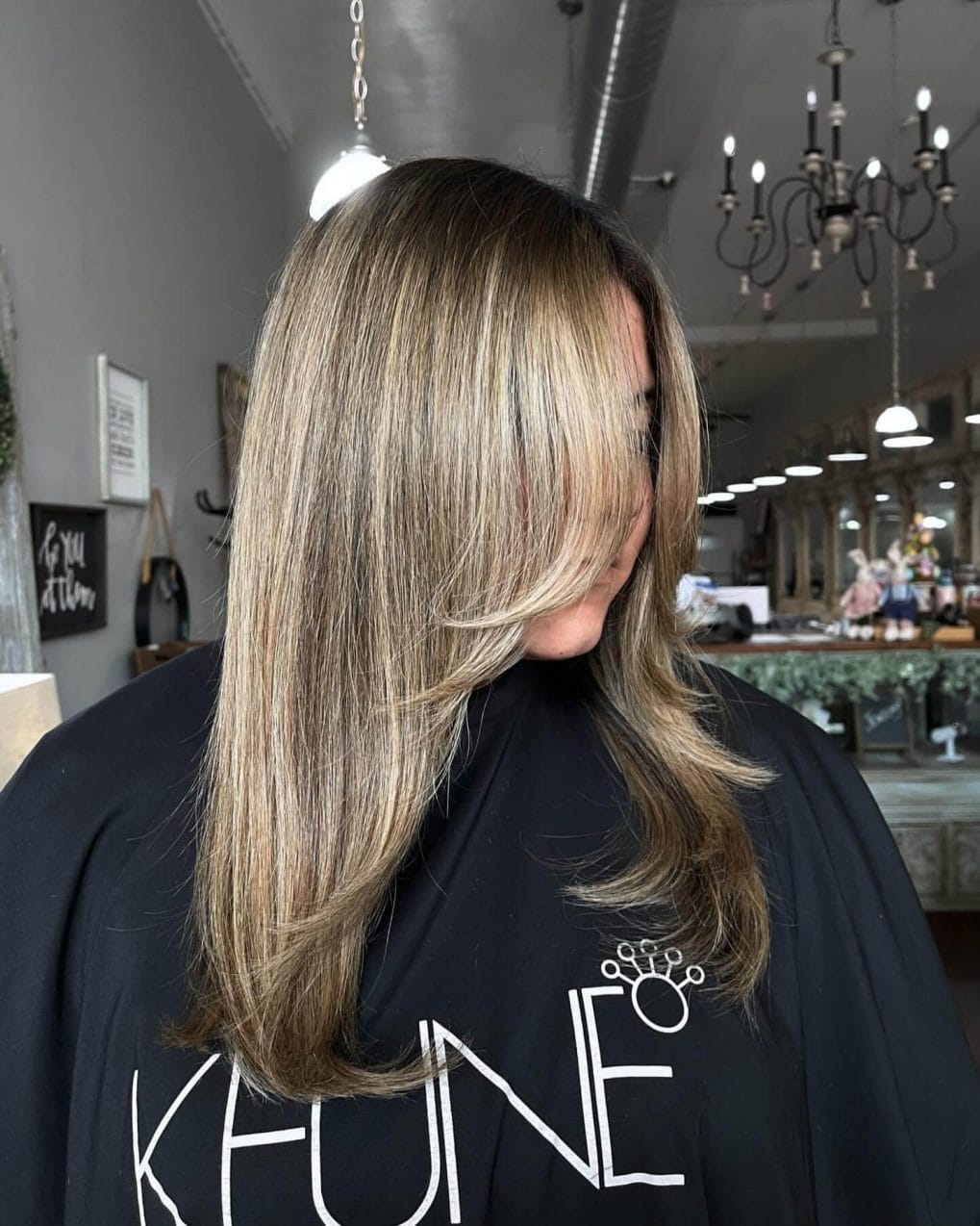 Medium-length straight hair with light blonde and brown balayage
