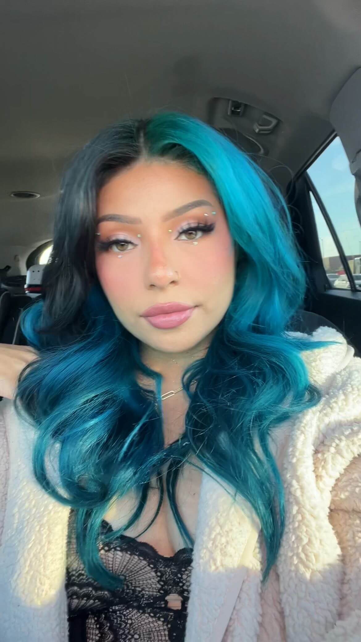 Mermaid vibe with long bright blue curls and volume