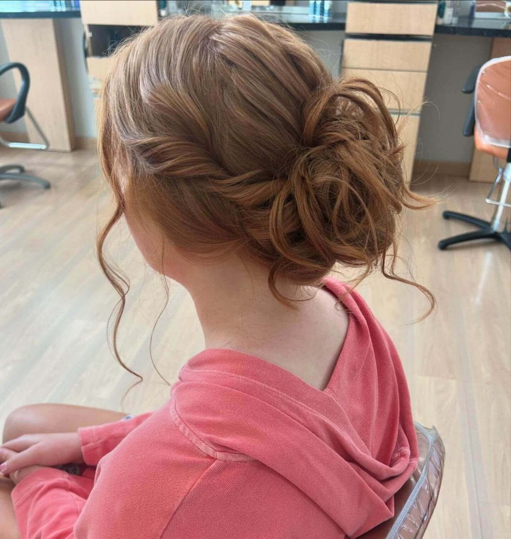 Messy red updo with romantic loose waves