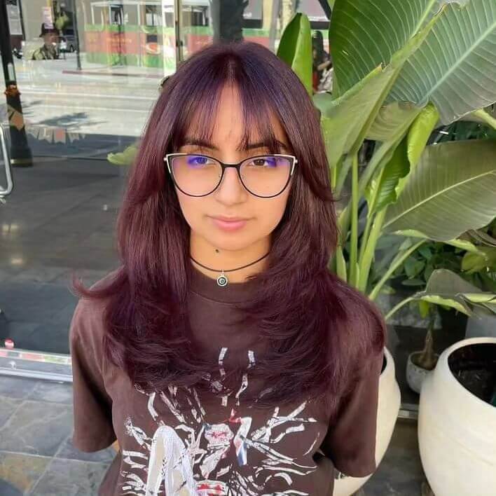 Plum mid-length hair with straight see-through bangs
