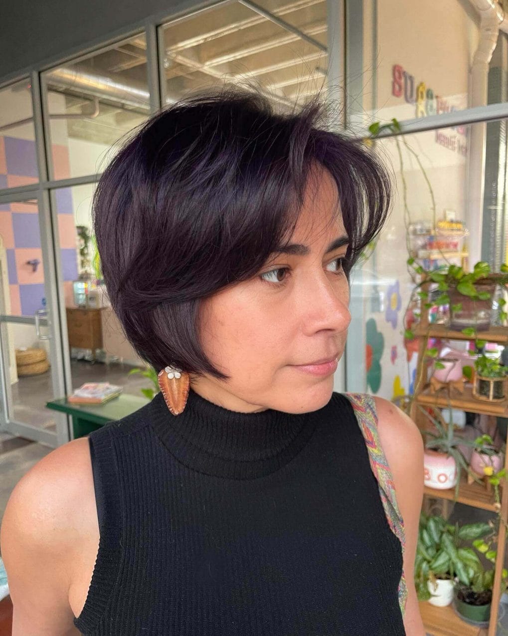 Plum bixie cut with a modern edge and fine texture