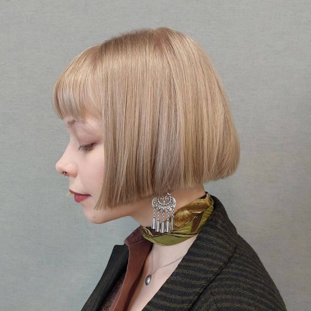 Neat French bob in light wheat blonde