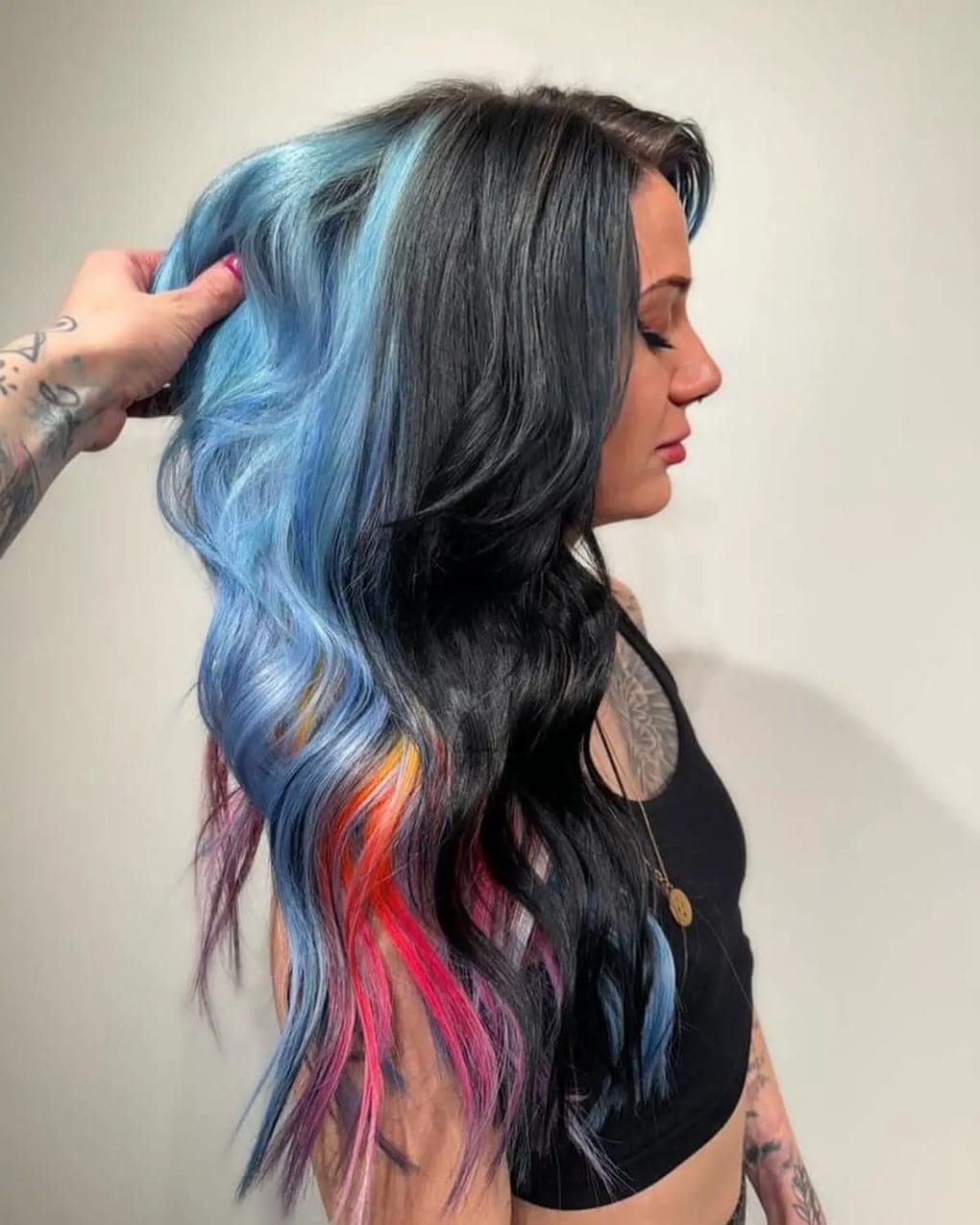 Ocean blue and neon pink splash on long layered waves