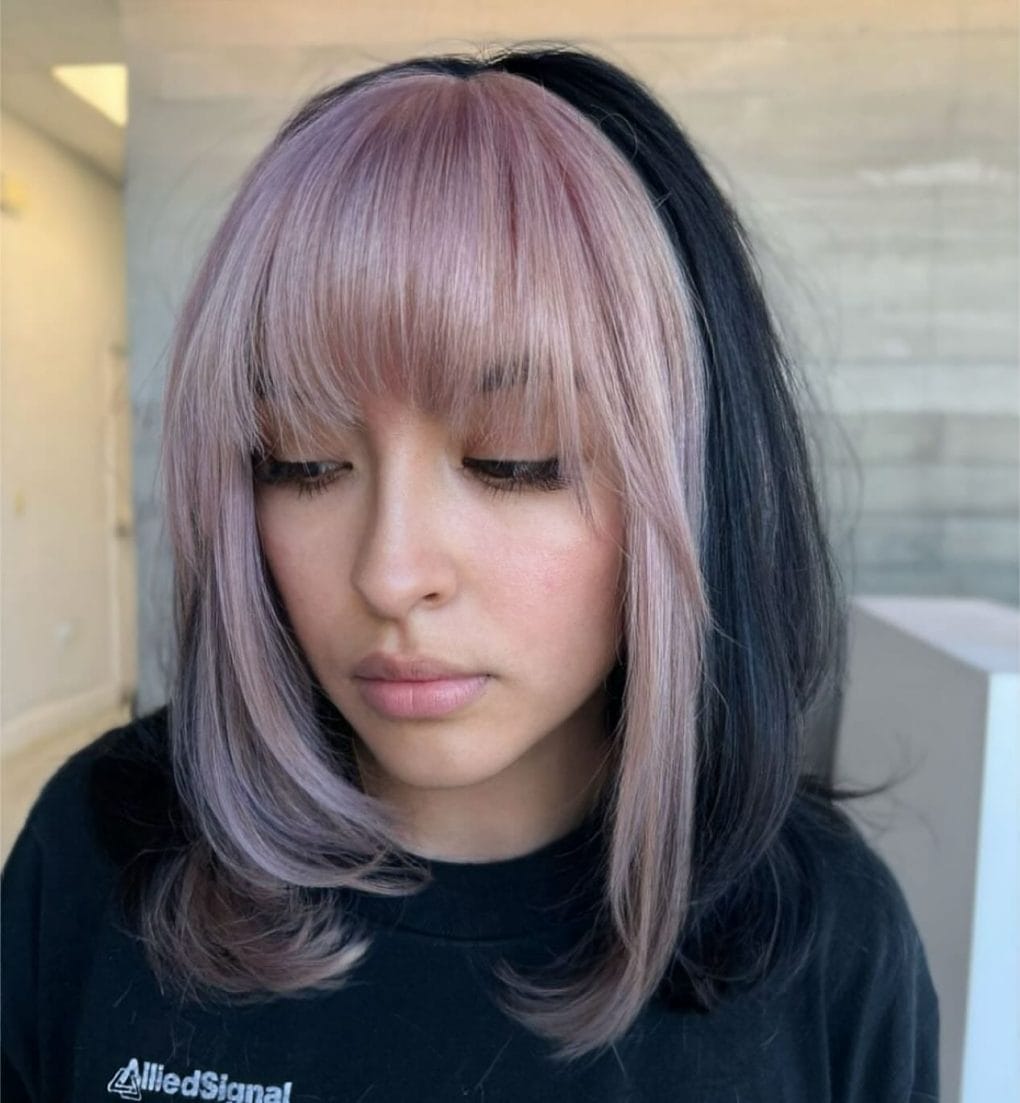 Sleek bob with pink and grey split and straight bangs