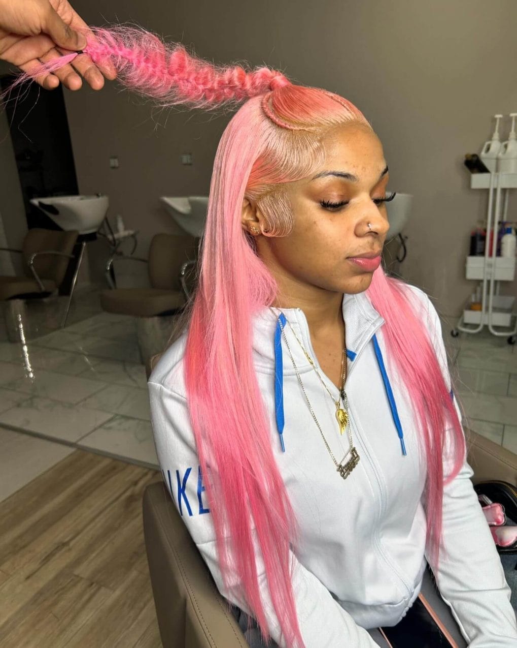 Pink hair with unique frontal swirl and color fade