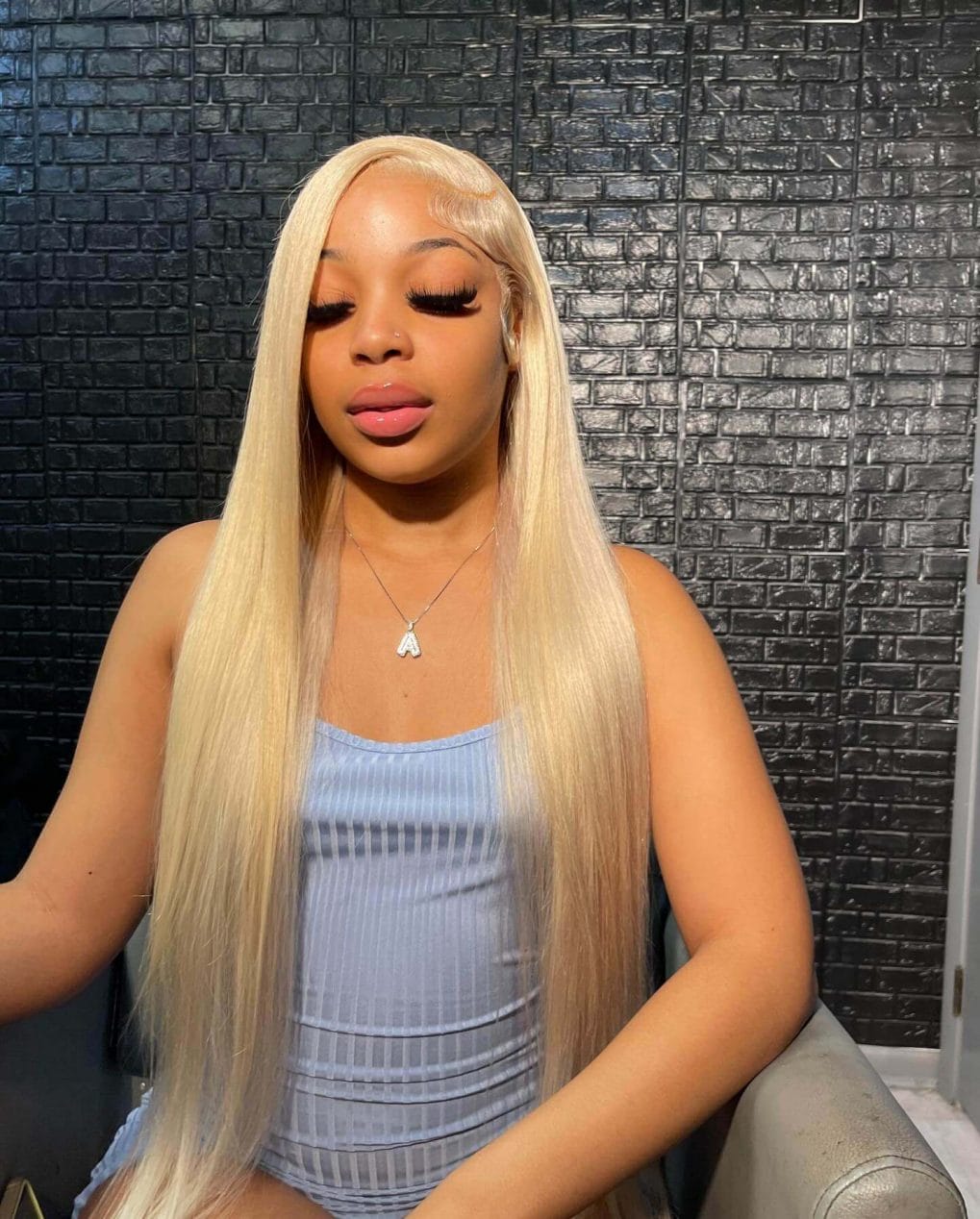 Bold, symmetrical platinum blonde with side part