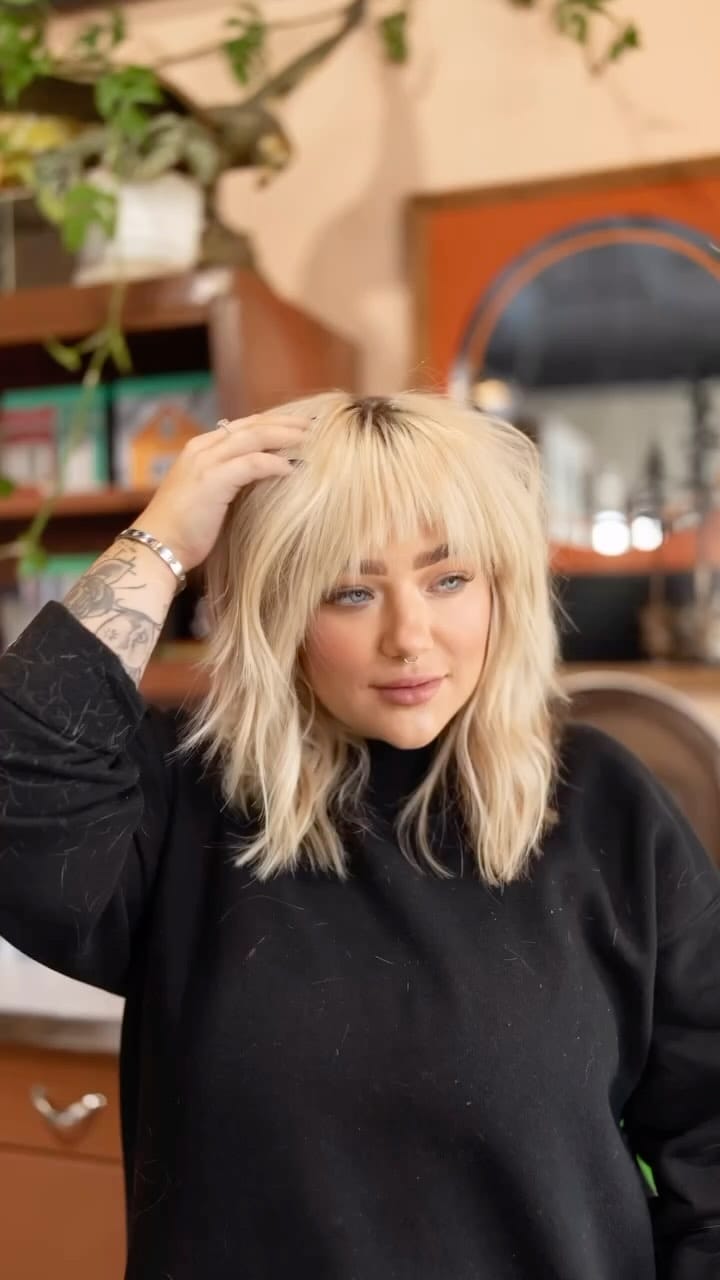 Playful blonde lob with tousled waves