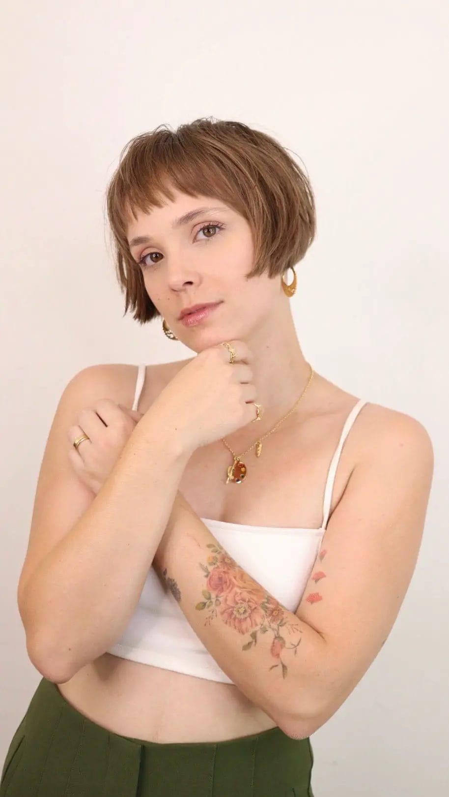 Light brown French bob with playful straight bangs