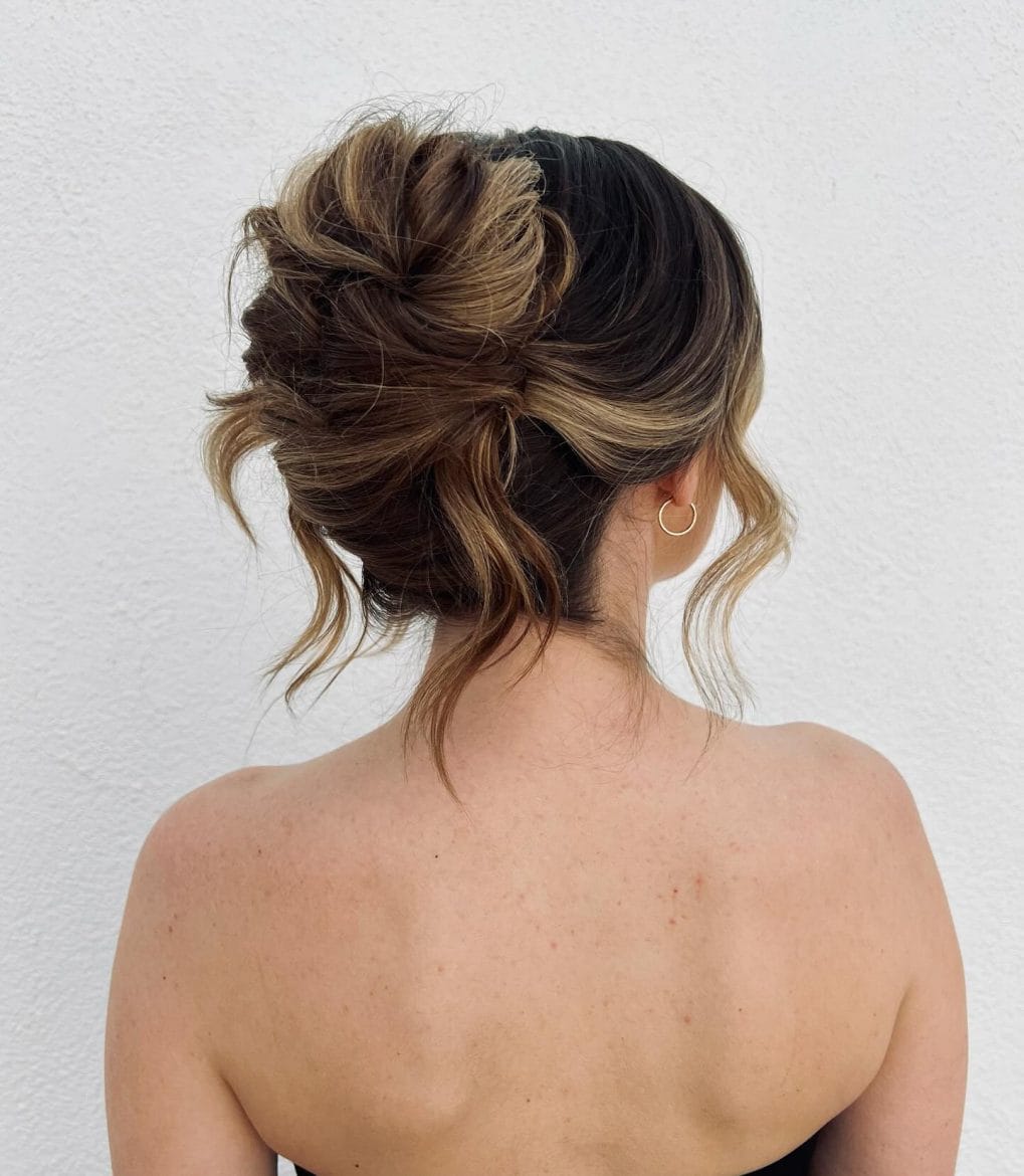 Effortless messy bun with dark to light hair shades