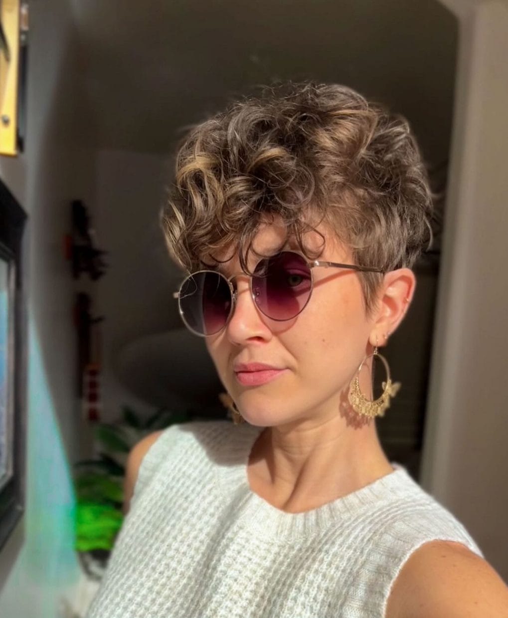 Playful short cut with wild curls and volume