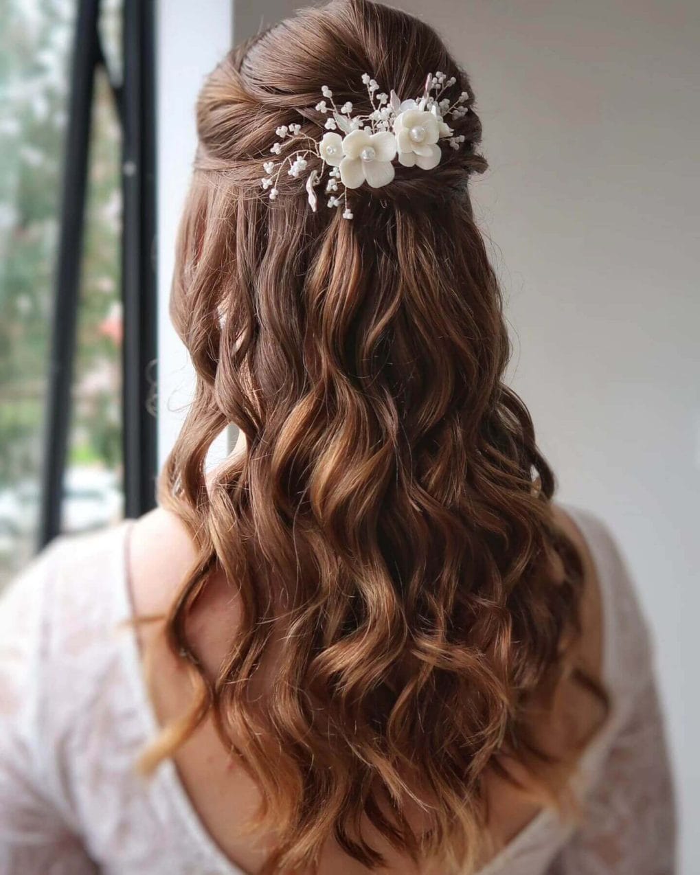 Polished waves with charming floral accents