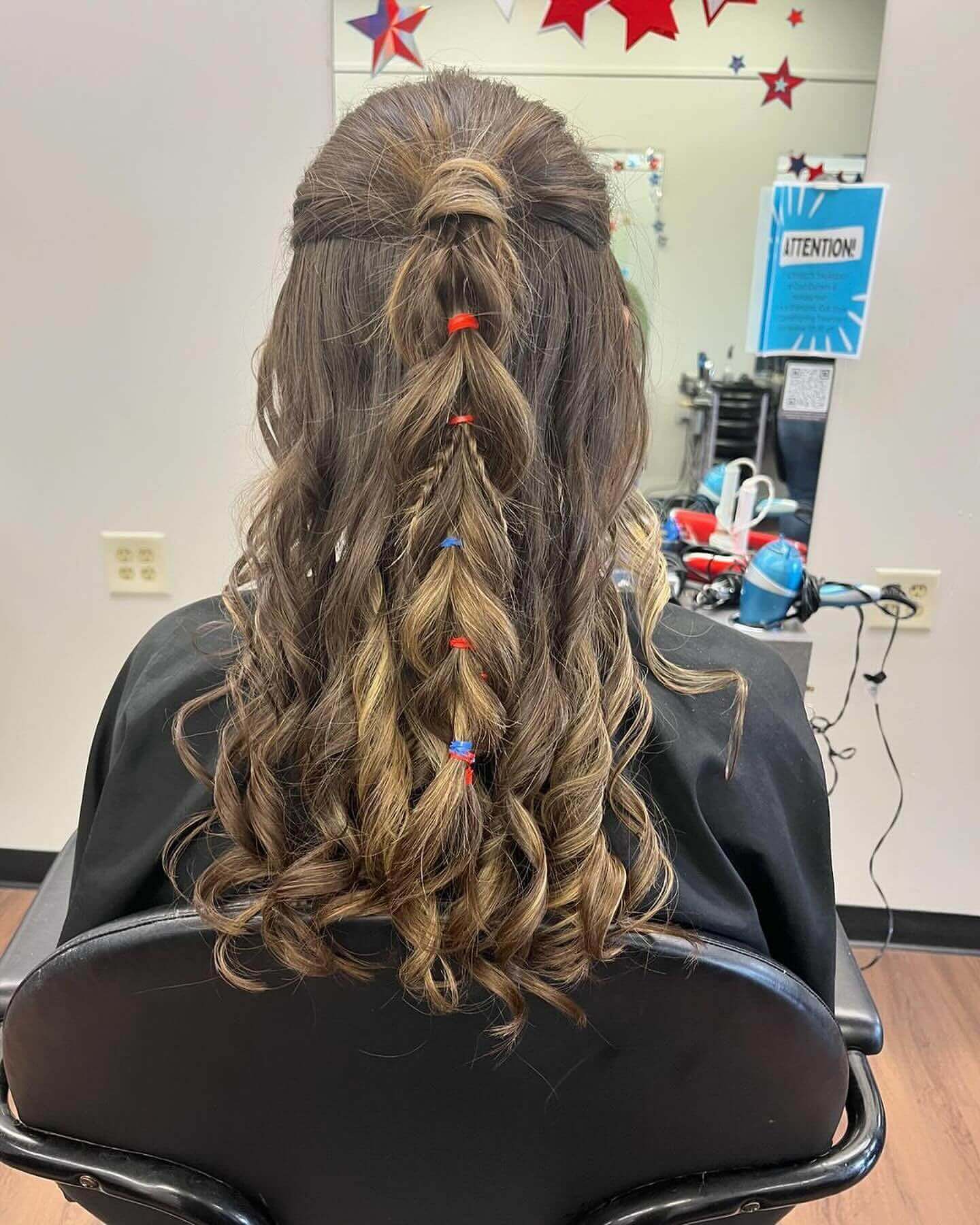 Playful half-up bubble braid with soft curls