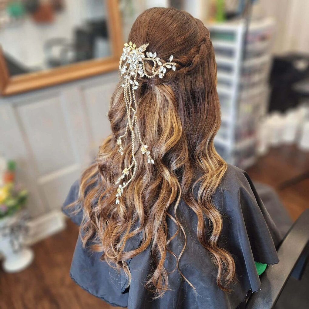 Loose cascading curls with braided crown and gems