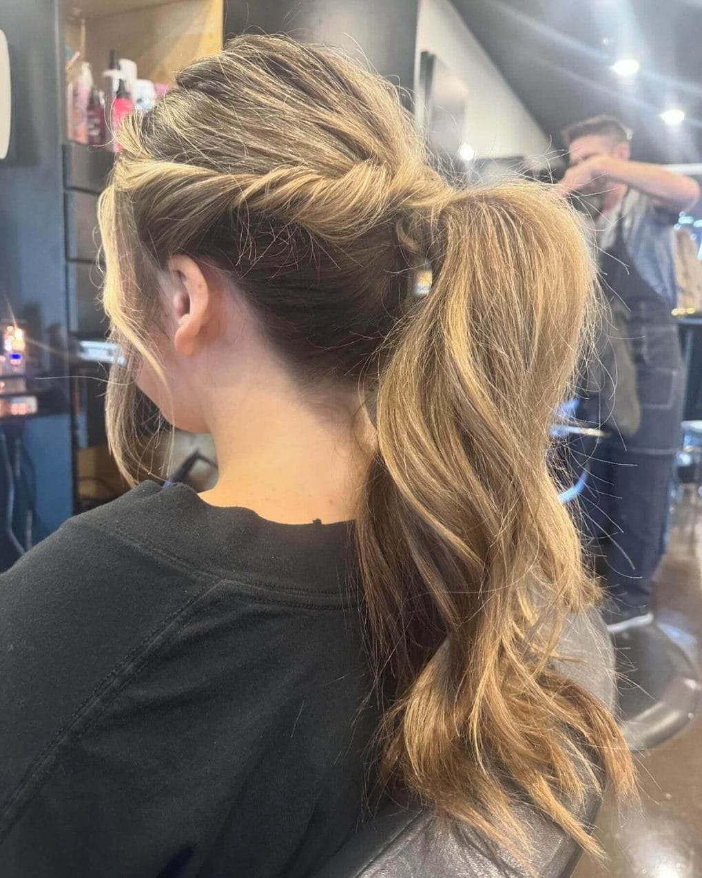 High voluminous ponytail with highlighted hair