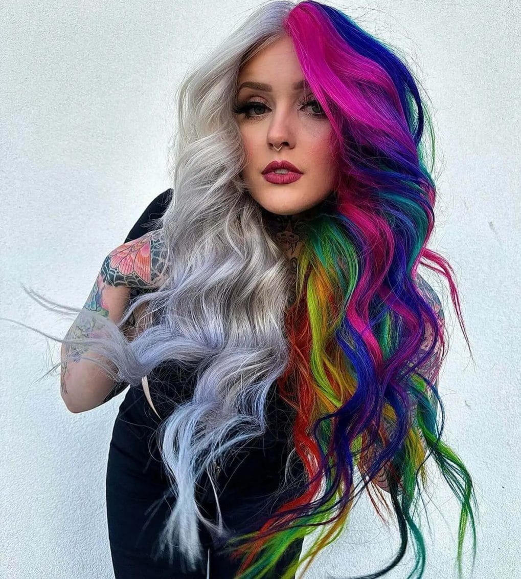 Long, wavy hair transitioning from silver-gray to rainbow colors, embodying the spirit of festival freedom.