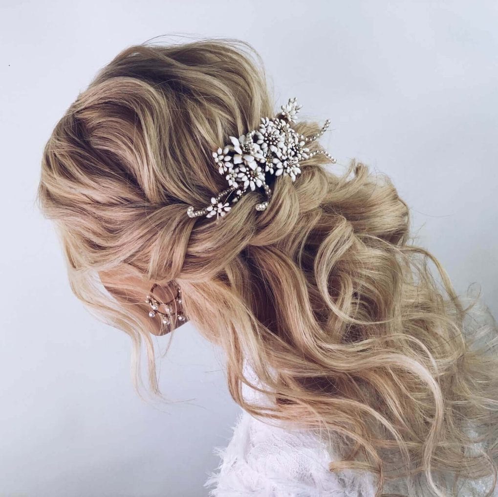 Romantic loose waves with floral accessory