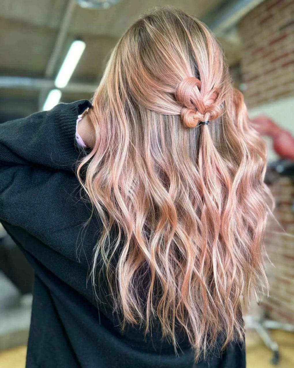 Soft beachy waves in a rose gold and blonde half-updo, ideal for a relaxed birthday look.