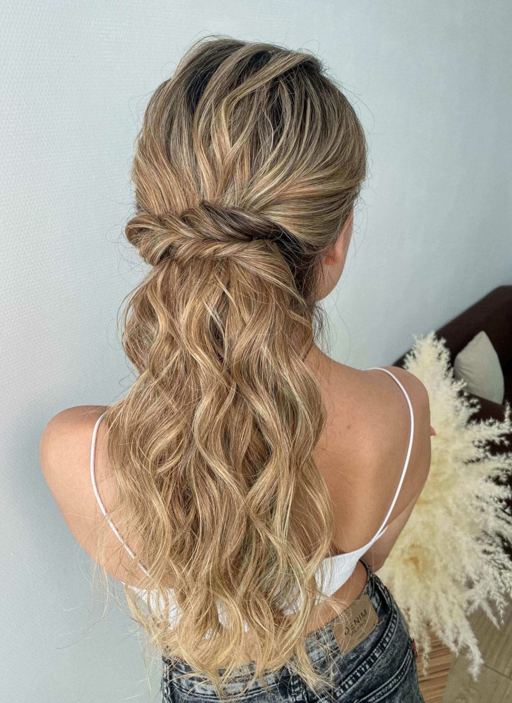 Laid-back sandy blonde locks in a loose, sophisticated braid