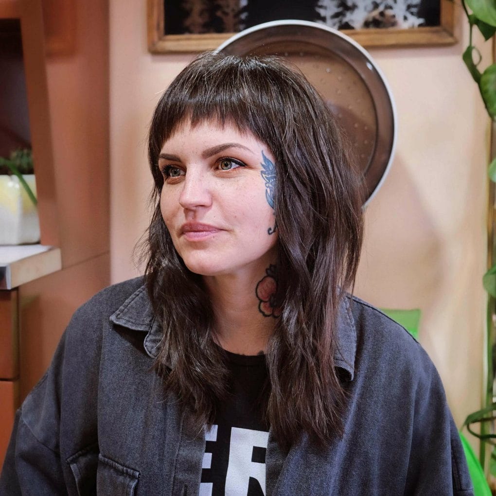 Shaggy layered cut with fringe skimming the eyes