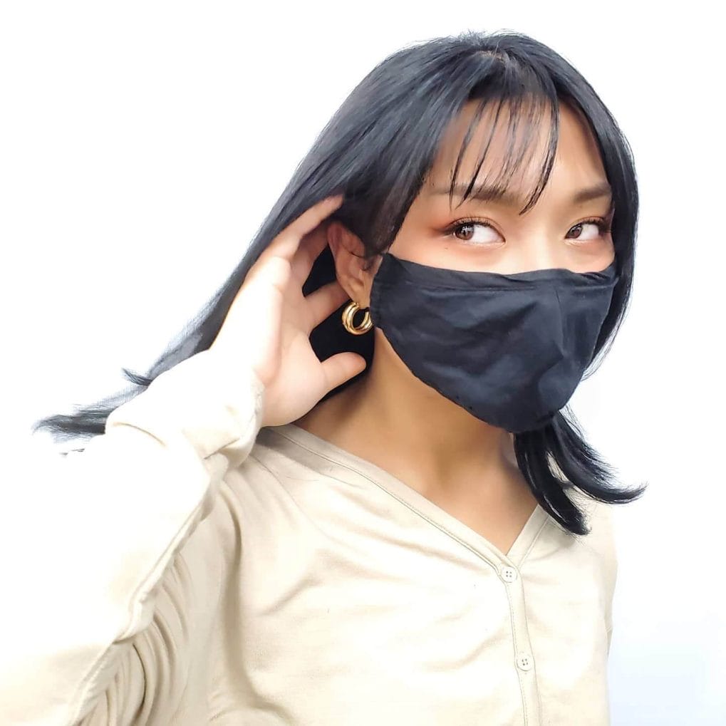 Shoulder-length bob with wispy see-through bangs