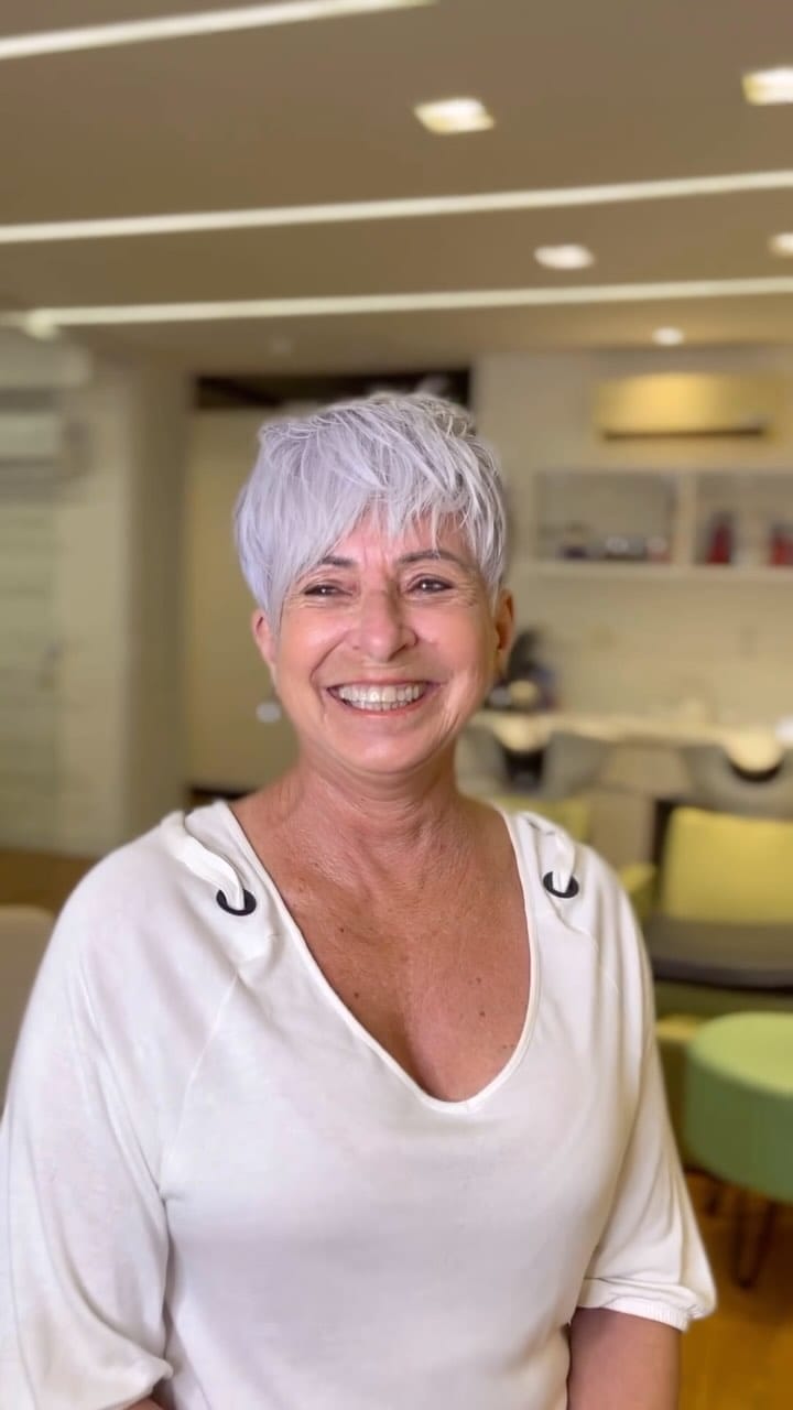 Joyful silver pixie with lifted roots and soft bangs