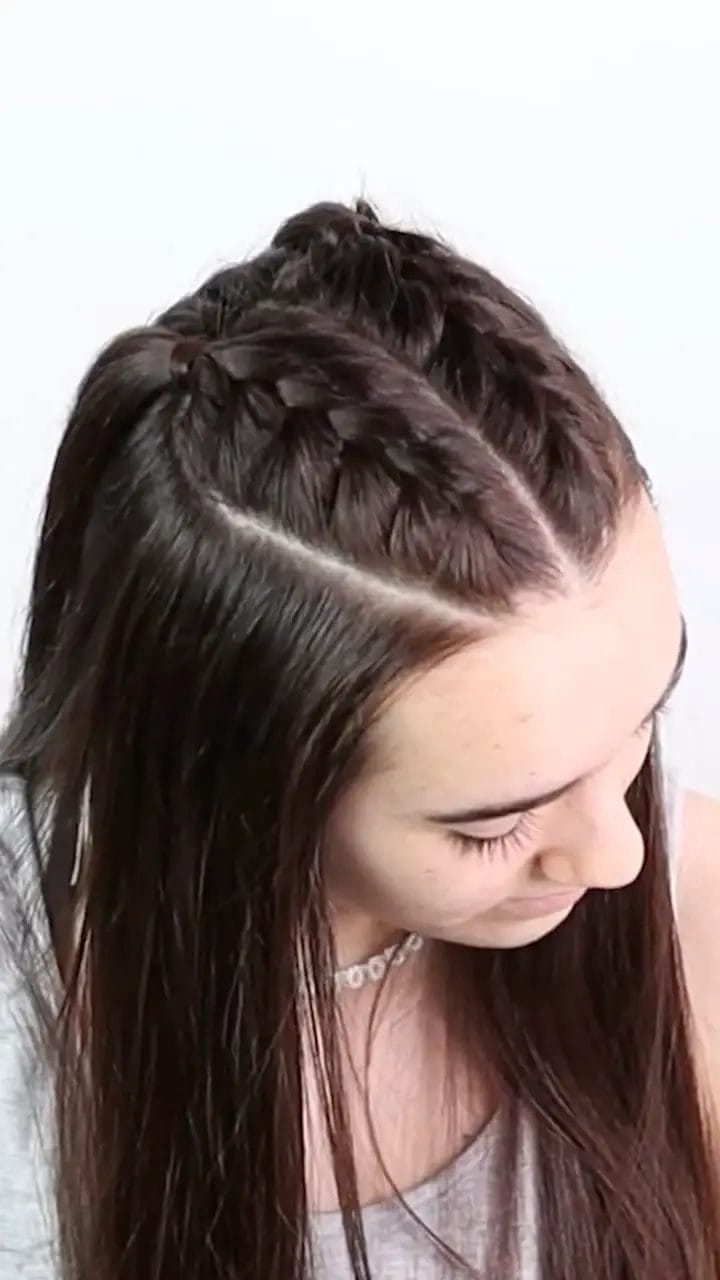 Neat half-up braid on straight dark hair for a sharp look