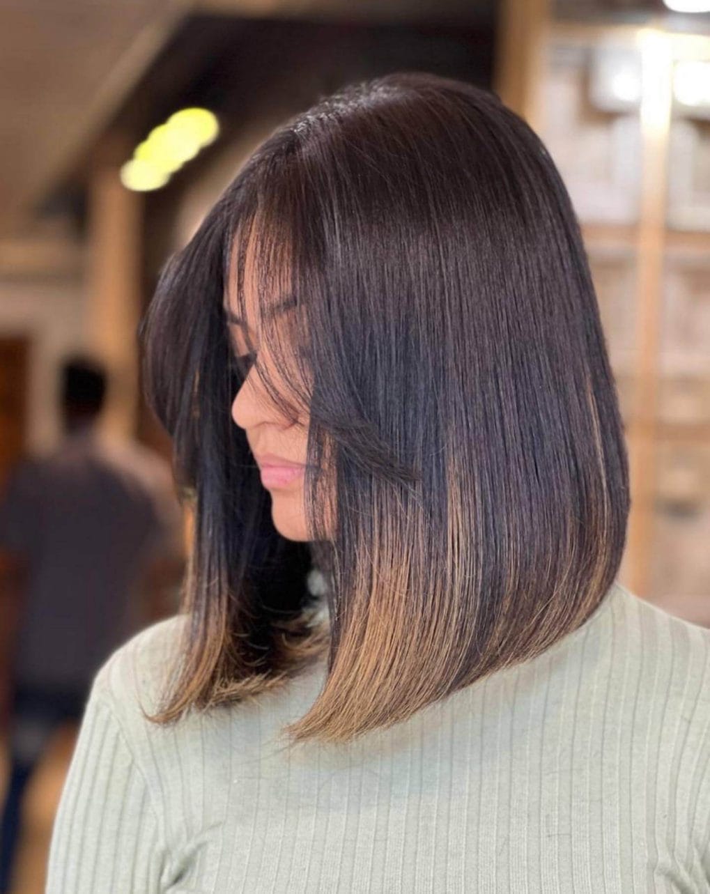 Straight ombrÃ© shoulder-length cut transitioning from brunette to sunlit brown.