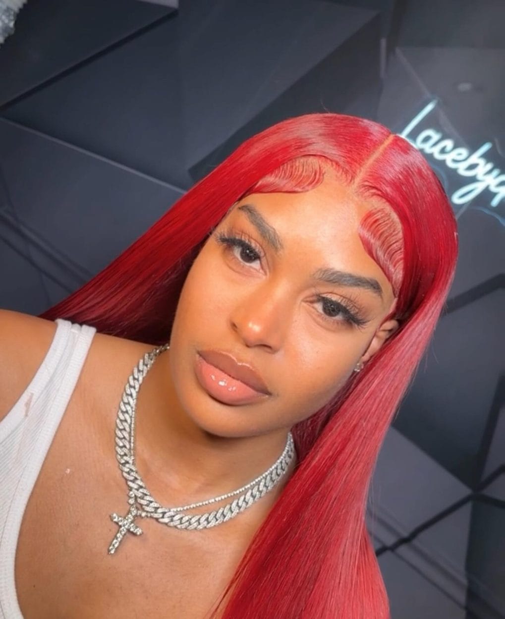 Straight, vivid red hair with sleek frontal wave
