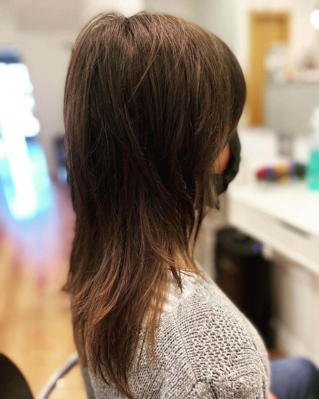 Sleek tapered octopus cut in multi-dimensional chocolate brown.