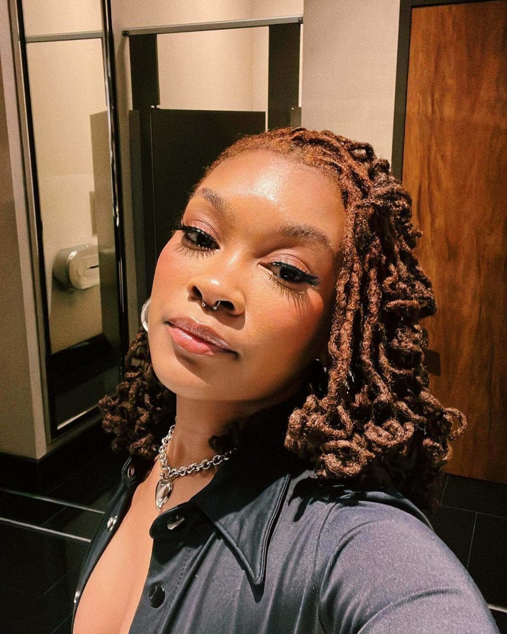 Softly twirled curly locs flowing naturally