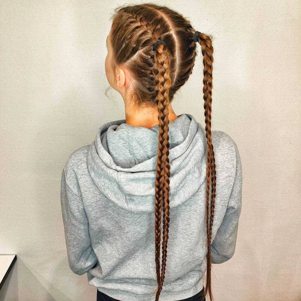 Double Dutch braids, tightly woven, practical for the gym