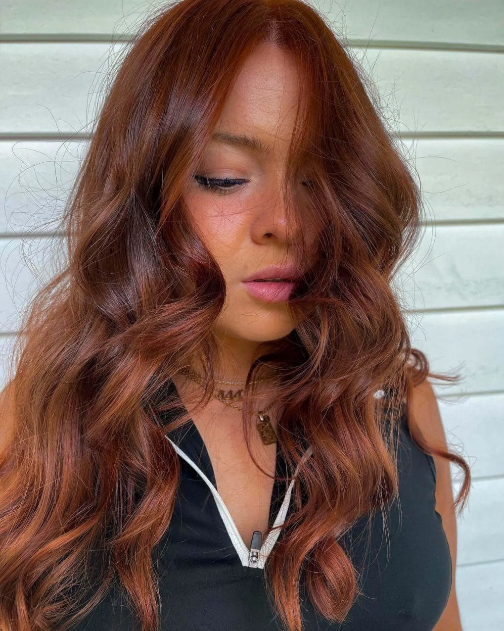 Stunning copper color with shadow root, vibrant tones, and long soft layers.