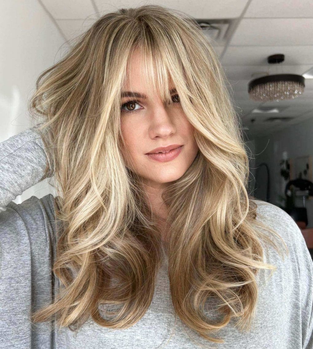 Blonde waves with see-through bangs