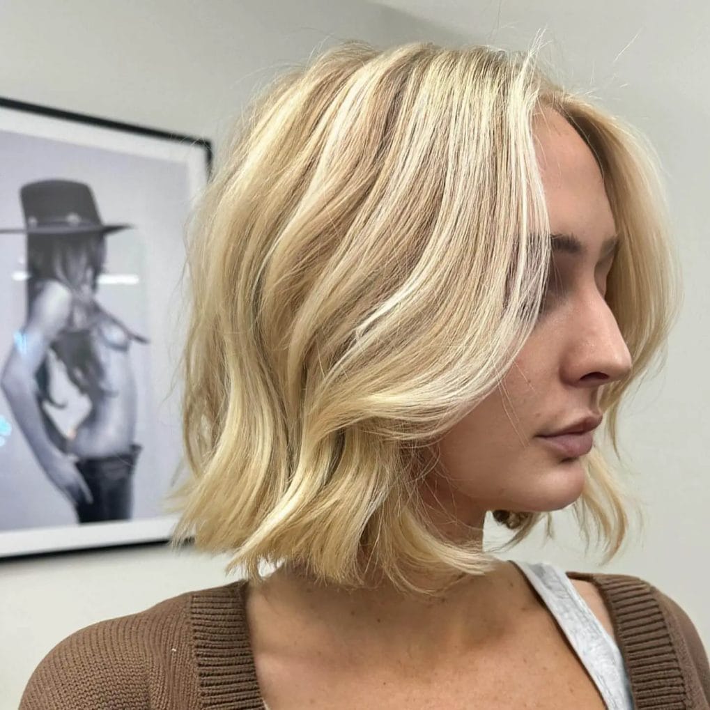 Sunny blonde French bob with beachy waves