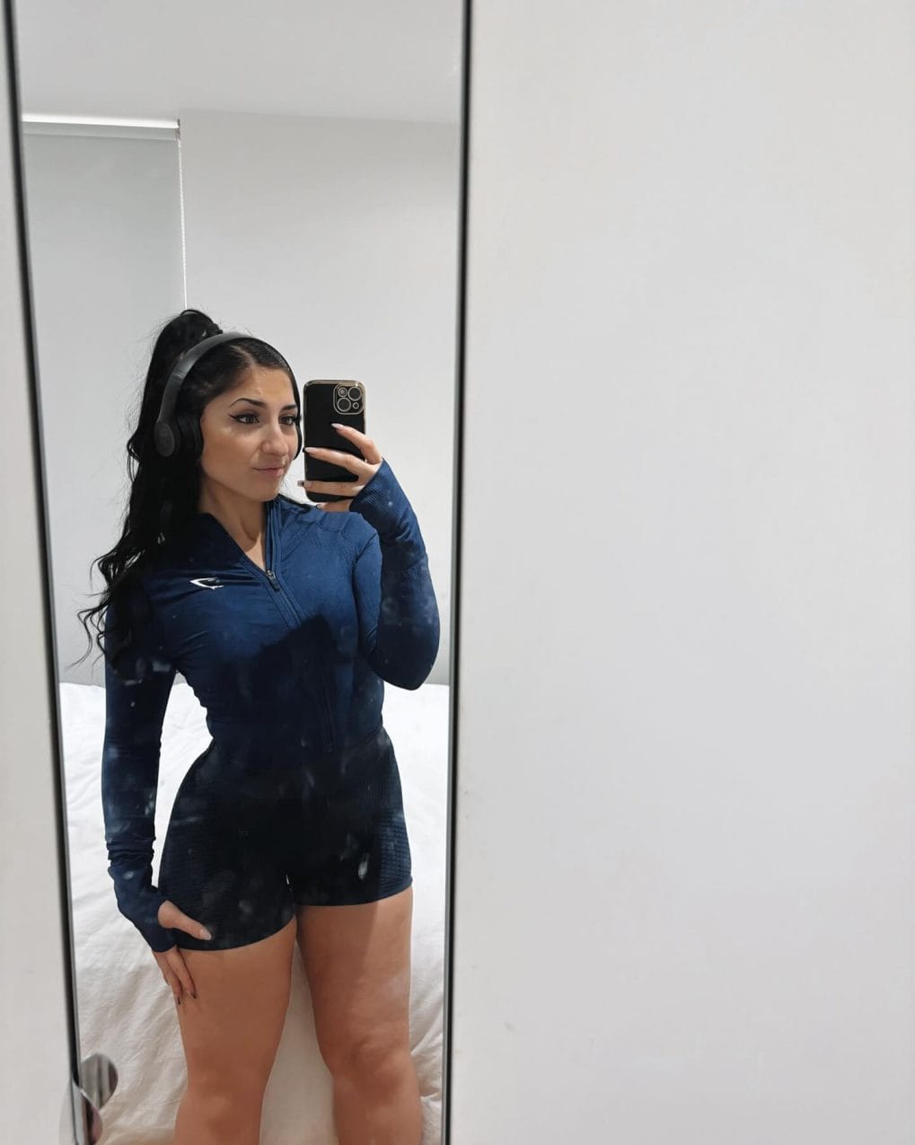 High, tight black bun for a no-nonsense gym session