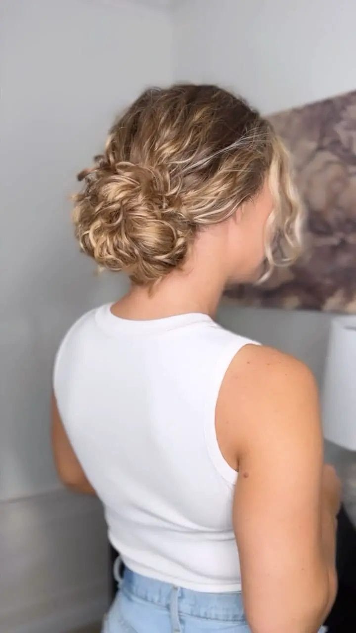 Fun tousled updo with playful messy look for summer