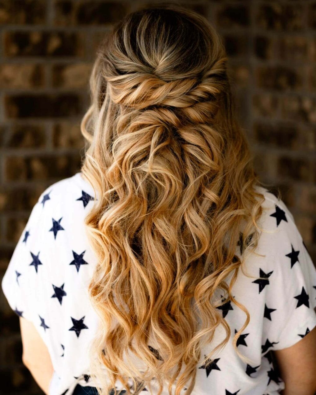 Twisted golden blonde curls with bouncy volume